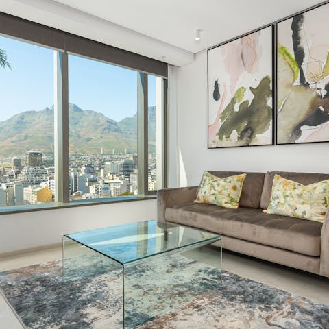 Take in stunning views from your living room's picture windows, a glass of South African wine in hand