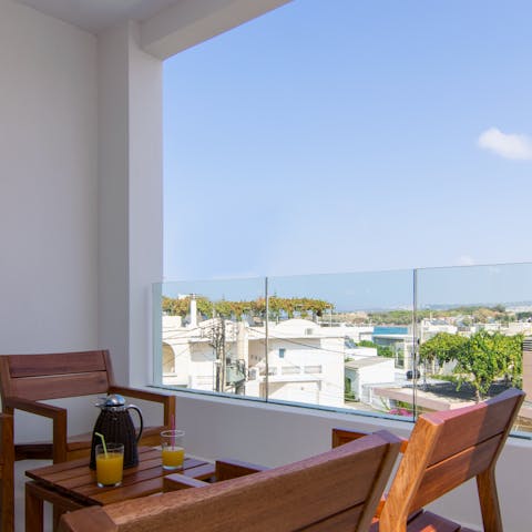 Enjoy your morning coffee with a view from your private balcony