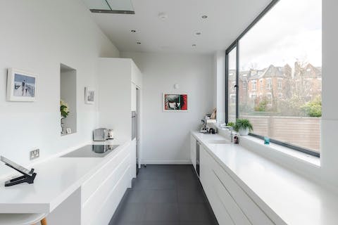 The sleek all-white kitchen