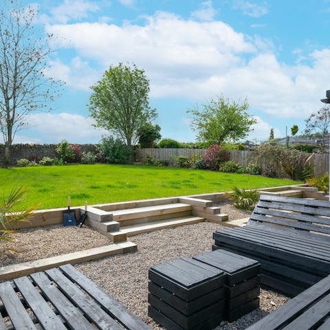 Make the most of sunny spells out in the garden's large lounge