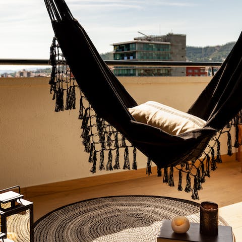 Stretch out with your holiday read in the swinging hammock