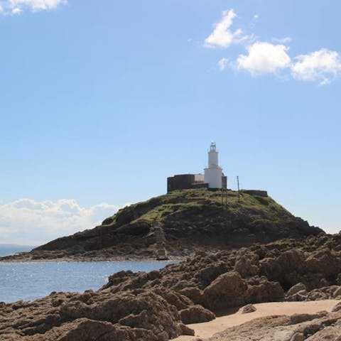 Wander along the seafront for half an hour until you reach Mumbles lighthouse