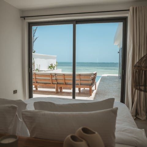 Open the sliding doors and listen to the waves