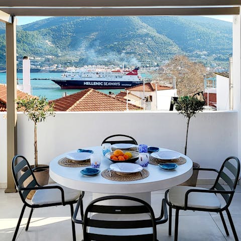 Admire the vistas of Mount Palouki and the port from the roof terrace