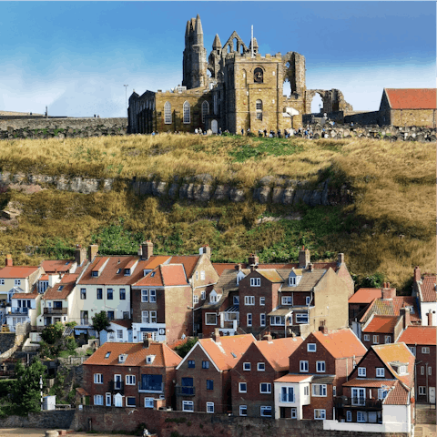 Visit the storied Whitby Abbey, a fourteen-minute walk away