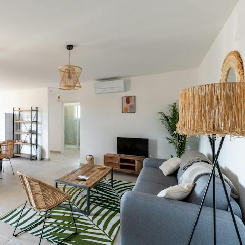 Relax in the gorgeous open living space after spending a day down at the beach