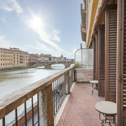 Look out to views of Pontes Vecchio and Santa Trinita from the apartment's balcony