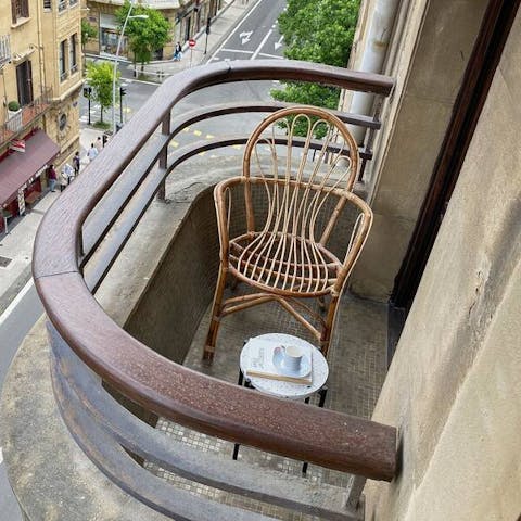 Relax on the balcony while you watch the world go by