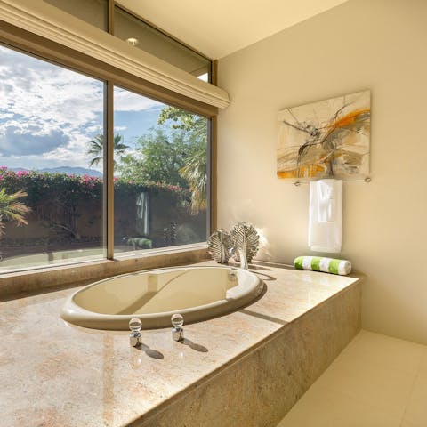 Soak in the oversized bath tub 