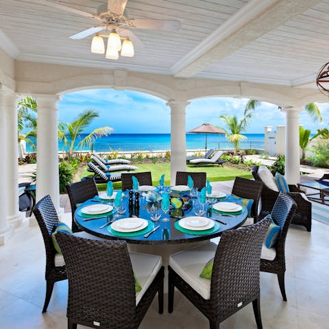 Dine alfresco for every meal, all while admiring that Caribbean Sea view