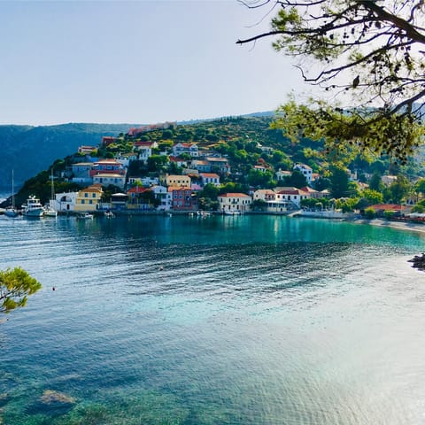 Explore the colourful Assos – an hour away by car