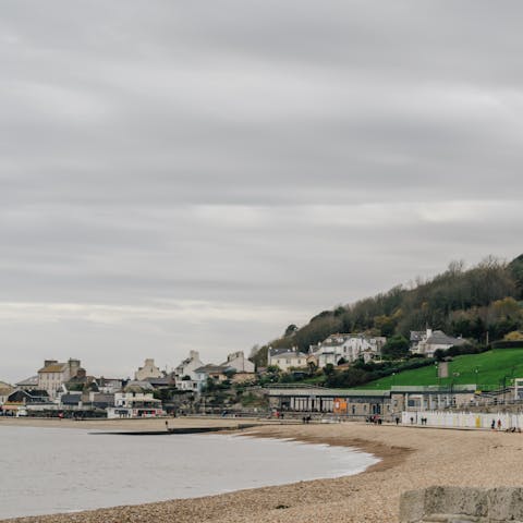 Pack your swimwear and stroll over to Lyme Regis Beach in five minutes