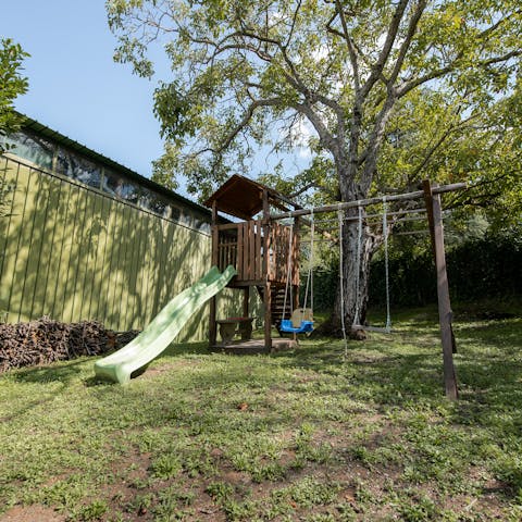 Let the kids have their fun on the communal outdoor play set 