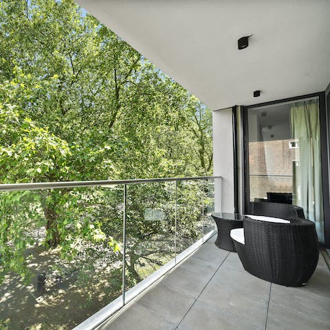 Relax on the balcony with green views