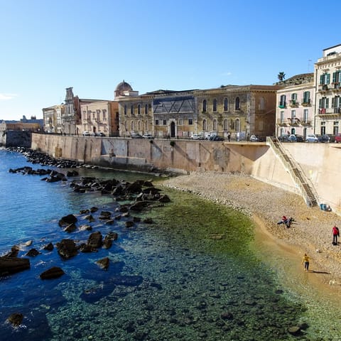 Jump in the car and drive over to the island of Ortigia
