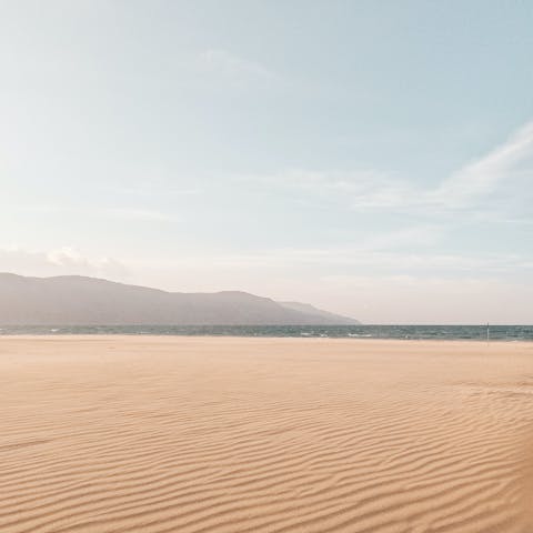 Spend unhurried afternoons stretched out on Platanias Beach, a short walk away