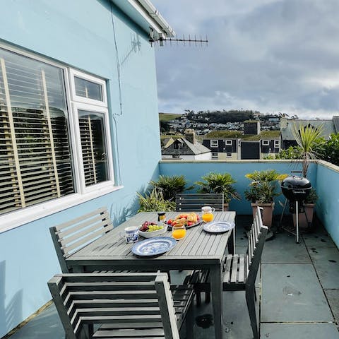 Come together for a spot of cream tea on the patio