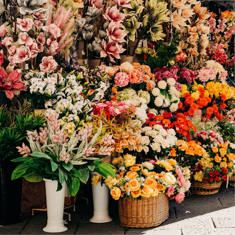 Pick up some fresh flowers from Green Market