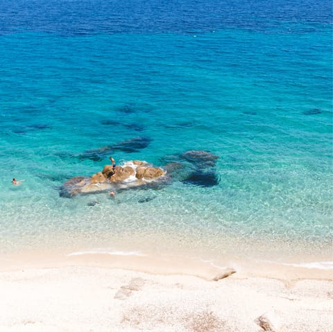 Discover the village of Psarou in Mykonos, where you'll find one of the most famous beaches on the island