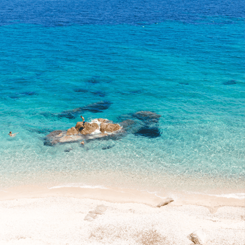 Discover the village of Psarou in Mykonos, where you'll find one of the most famous beaches on the island