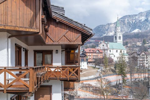 Stand out on the home's balcony and admire the scenic Alpine views