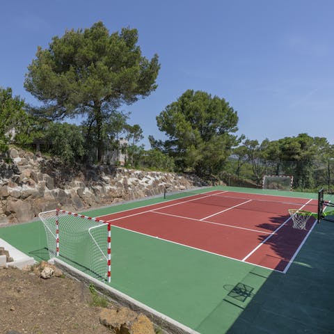 Play tennis, football, or basketball on the outdoor court