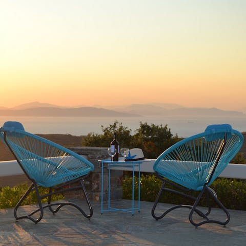 Watch the sunset from the private terrace over a Greek-inspired aperitif of olives and wine
