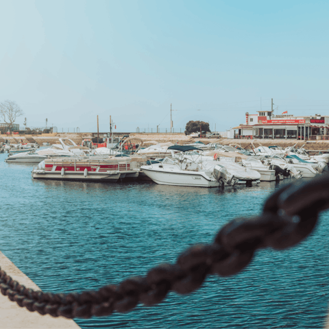 Hop on a ferry to the beach from the Faro Marina, just minutes from your door