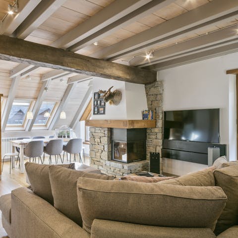 Cosy up by the fire after a long day exploring the Spanish Pyrenees – you can play board games or read a book on the L-shaped sofa