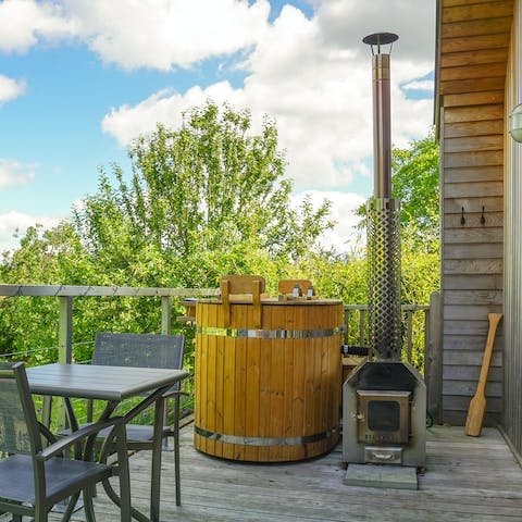 Hop into the wood-fired hot tub and watch the natural world go by