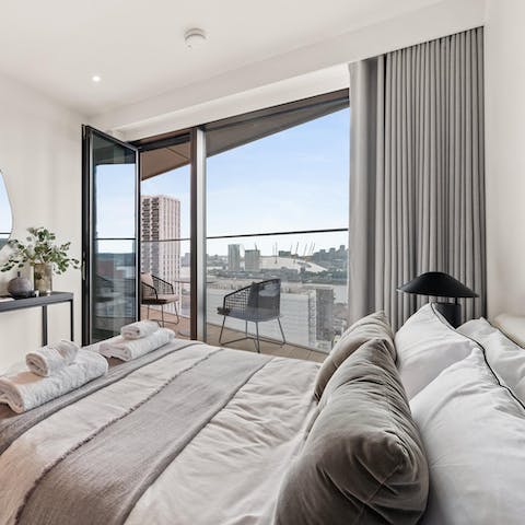 Wake up and admire the impressive city views from bed