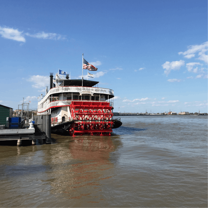 Board the Steamboat Natchez for an evening jazz cruise along the Mississippi, a ten-minute walk away
