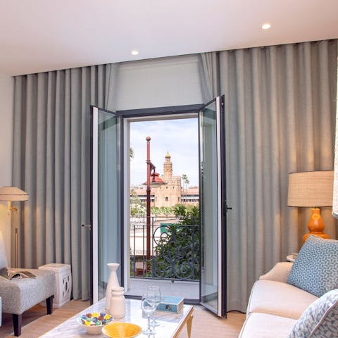 Admire the views of the Torre del Oro from the living room 