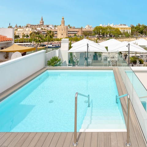 Cool off from the Seville sun in the shared pool