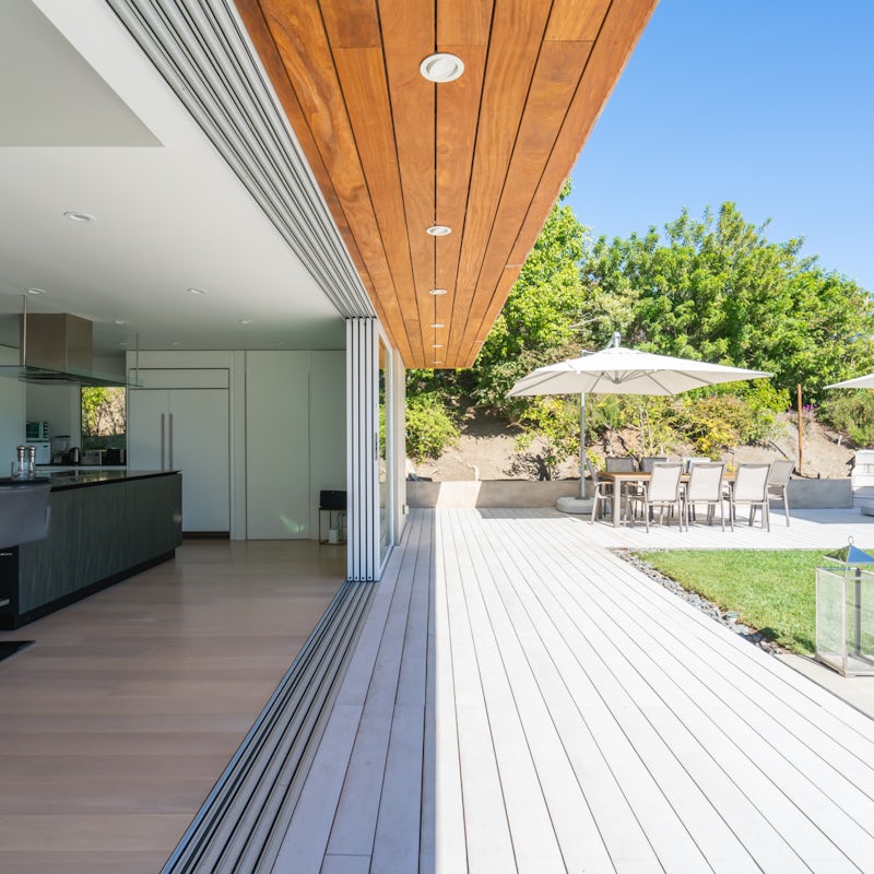 Get the best of both worlds with the homes seamless indoor/outdoor living set up