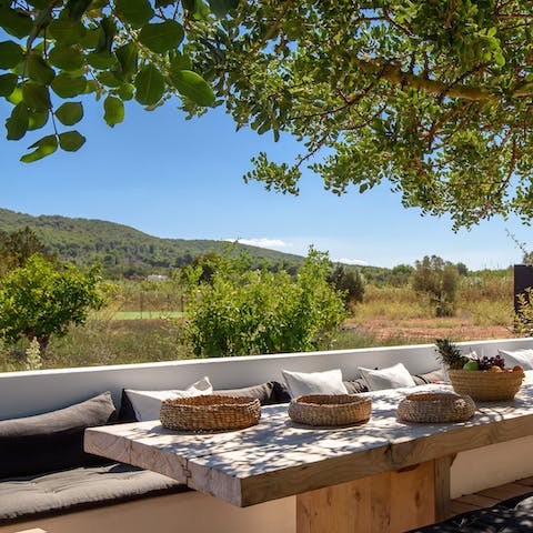 Dine alfresco under the shade of the mature trees