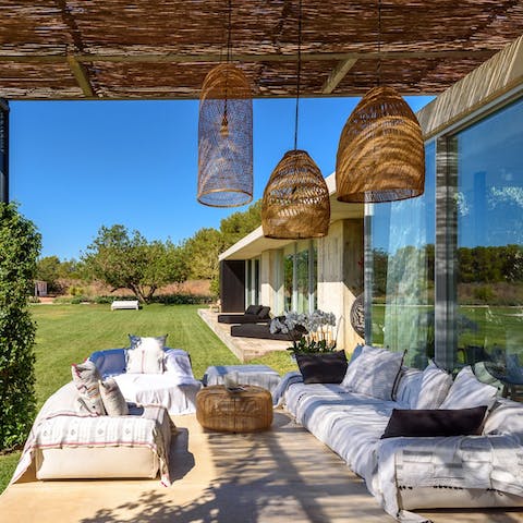 Relax in the dappled light of the outdoor seating area