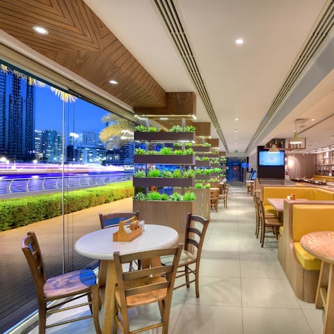 Dine at the on-site restaurant overlooking Dubai Marina 