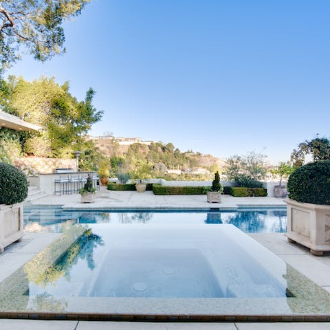 Slip into your swimwear and hit the home's swimming pool and spa pool