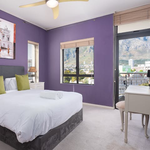 Wake up to Table Mountain views in the main bedroom