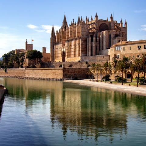 Admire the Cathedral of Santa Maria of Palma, a six-minute stroll away