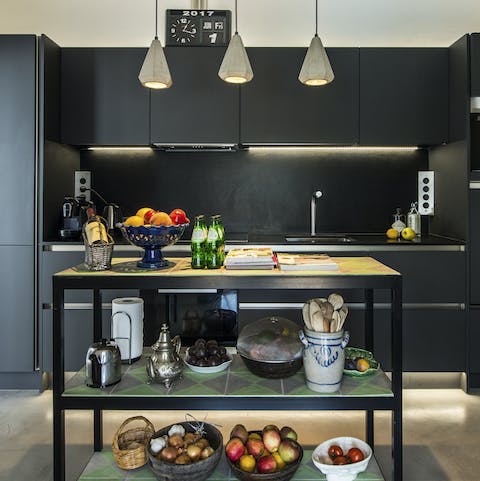 Flex your culinary muscles in the sleek kitchen