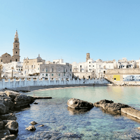 Explore Monopoli and visit Porto Rosso beach, only a short drive away