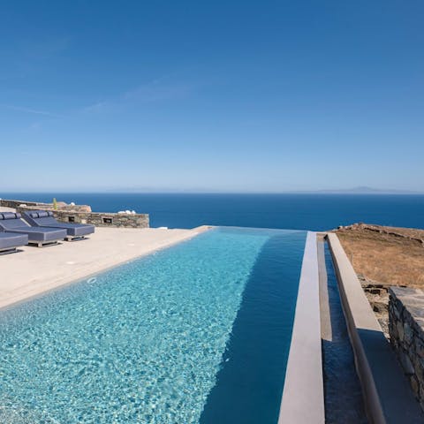 Swim to the edge of the infinity pool to admire the horizon