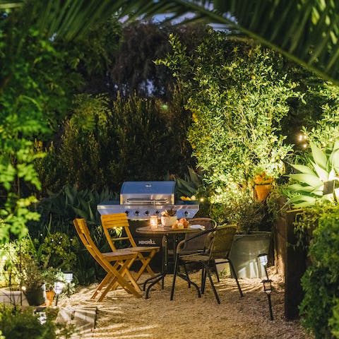 Embrace balmy evenings with drinks and barbecue meals in the garden