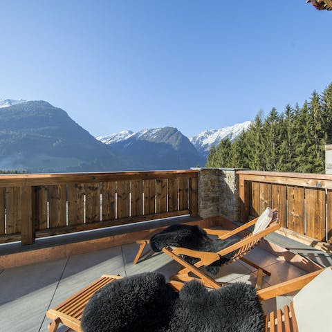 Chill out on the secluded balcony overlooking stunning mountain views 