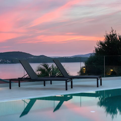 Enjoy a peaceful view of the Adriatic Sea from the pool terrace