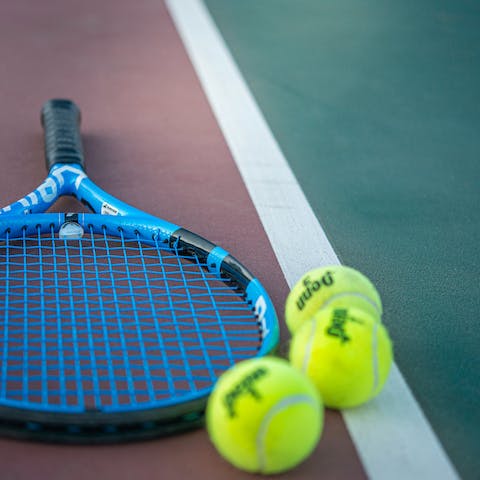 Practice your serve on the communal tennis courts  