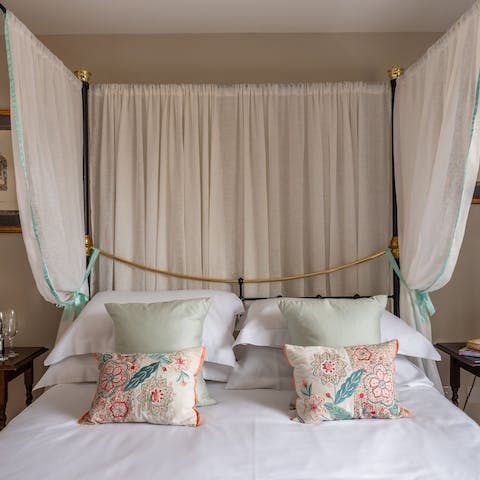 Sleep like royalty in the sumptuous four-poster bed