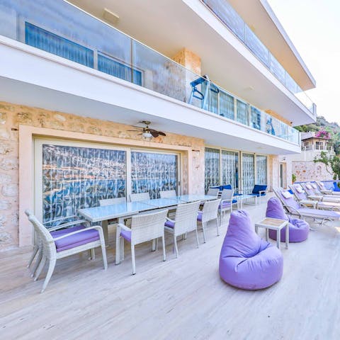 Gather on the terrace – with plenty of room to lounge and dine